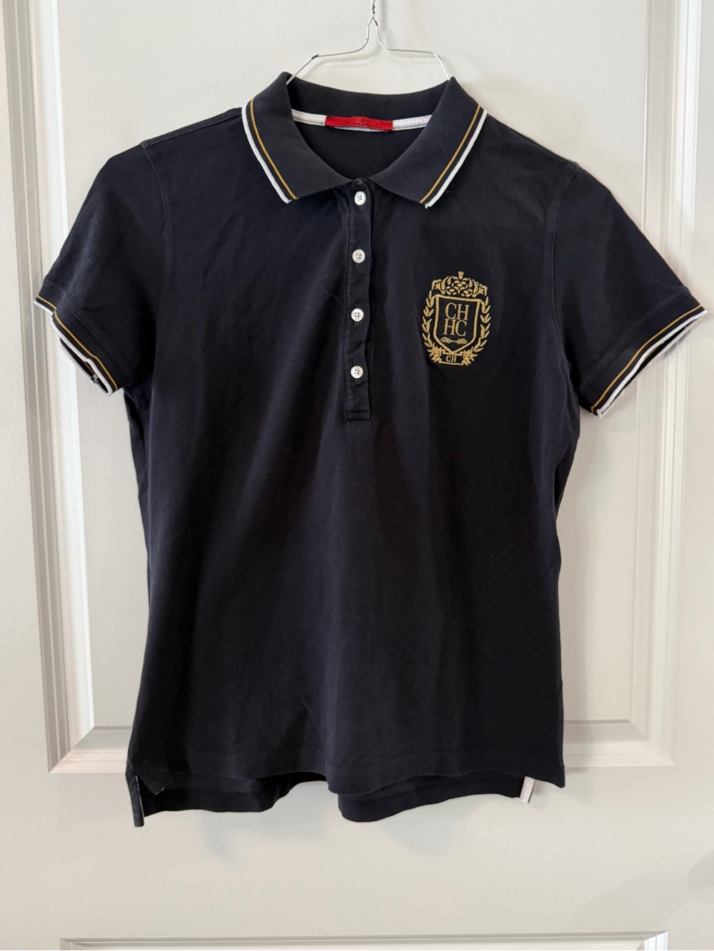 Carolina Herrera Navy Polo with Gold Crest and Trim